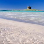 Vista della torre aragonese dalla spiaggia de la Pelosa a Stintino