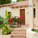 Flowered entrances in Club Esse Cala Gonone Beach Village