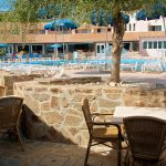 Poolside tables at Club Esse Cala Gonone Beach Village